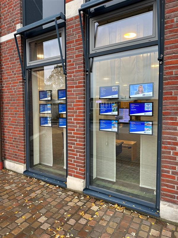 Digital property displays in a modern office